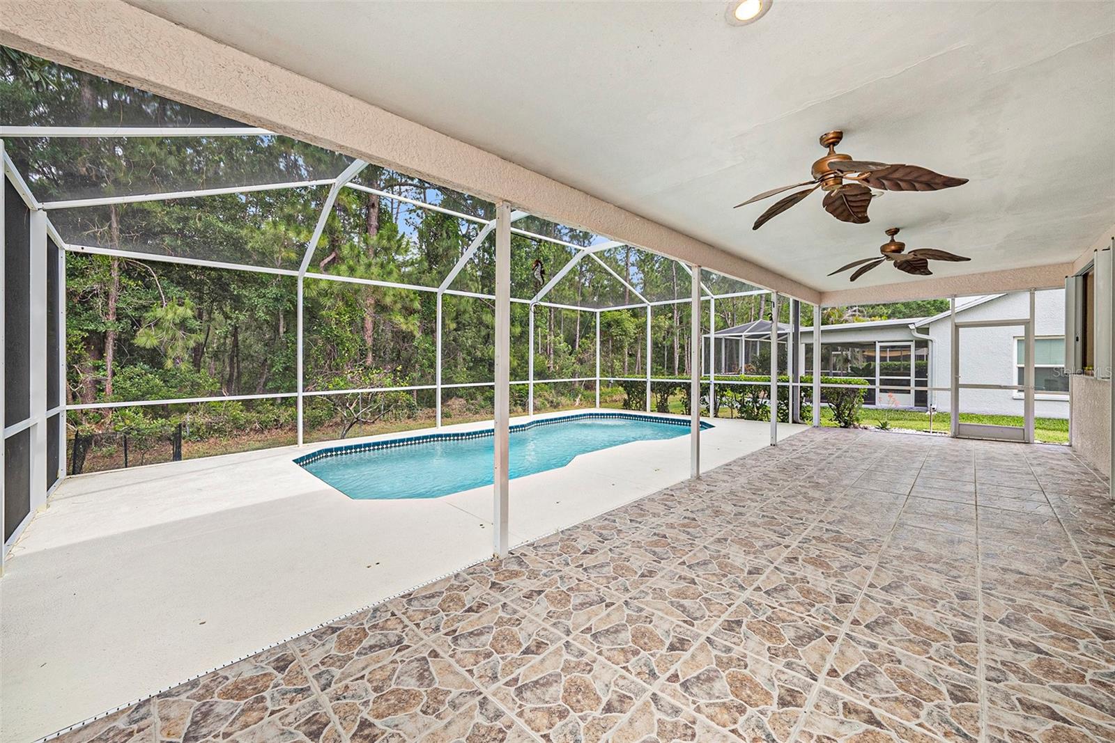 Your backyard oasis boarders a nature preserve so the serenity is yours!