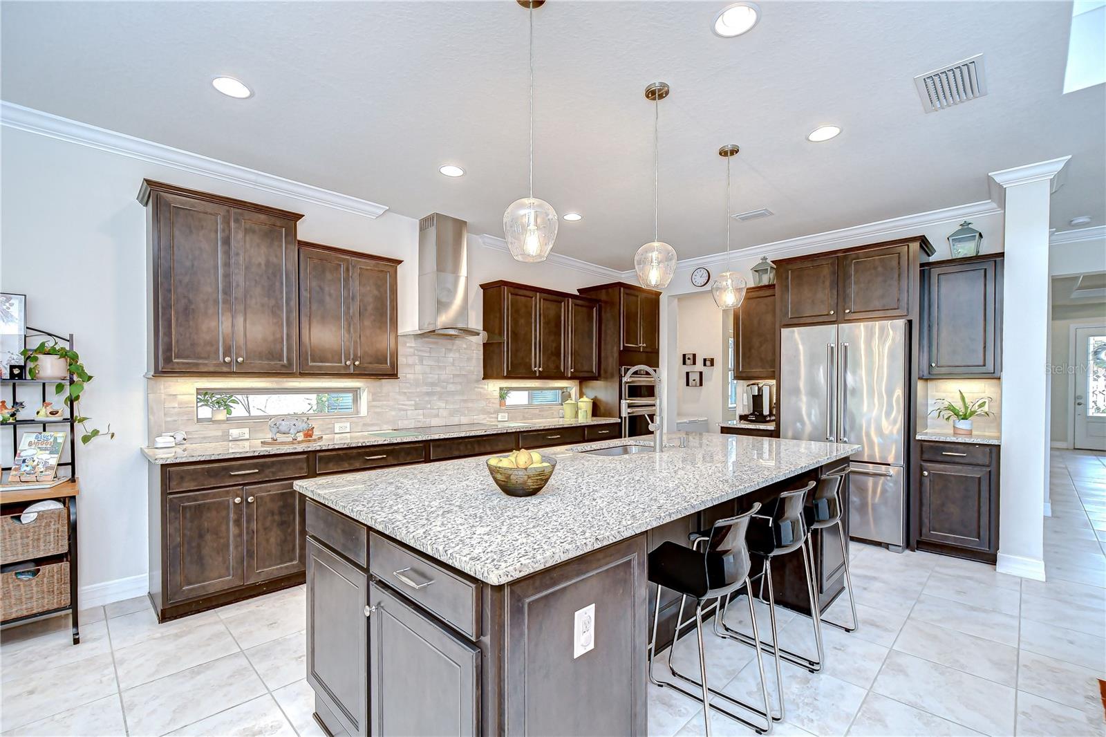 GORGEOUS kitchen with gleaming granite countertops perfect for culinary adventures and gatherings