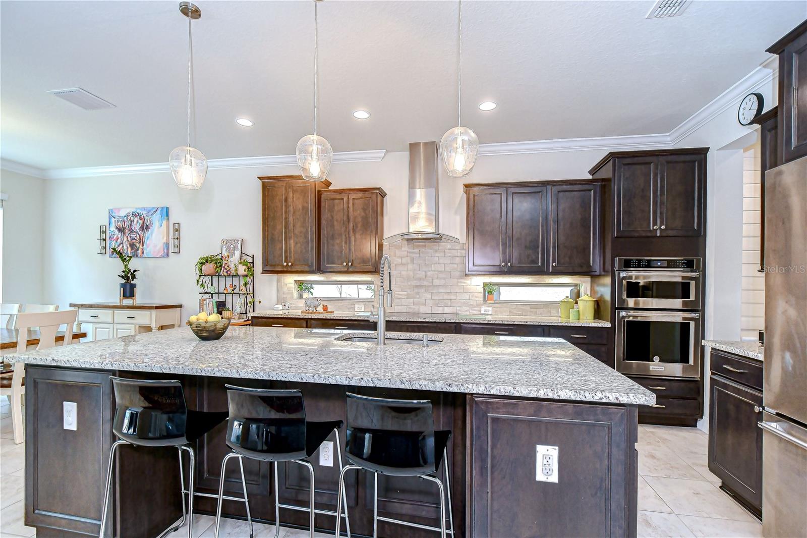 Huge center island, built-in appliances complete this space!