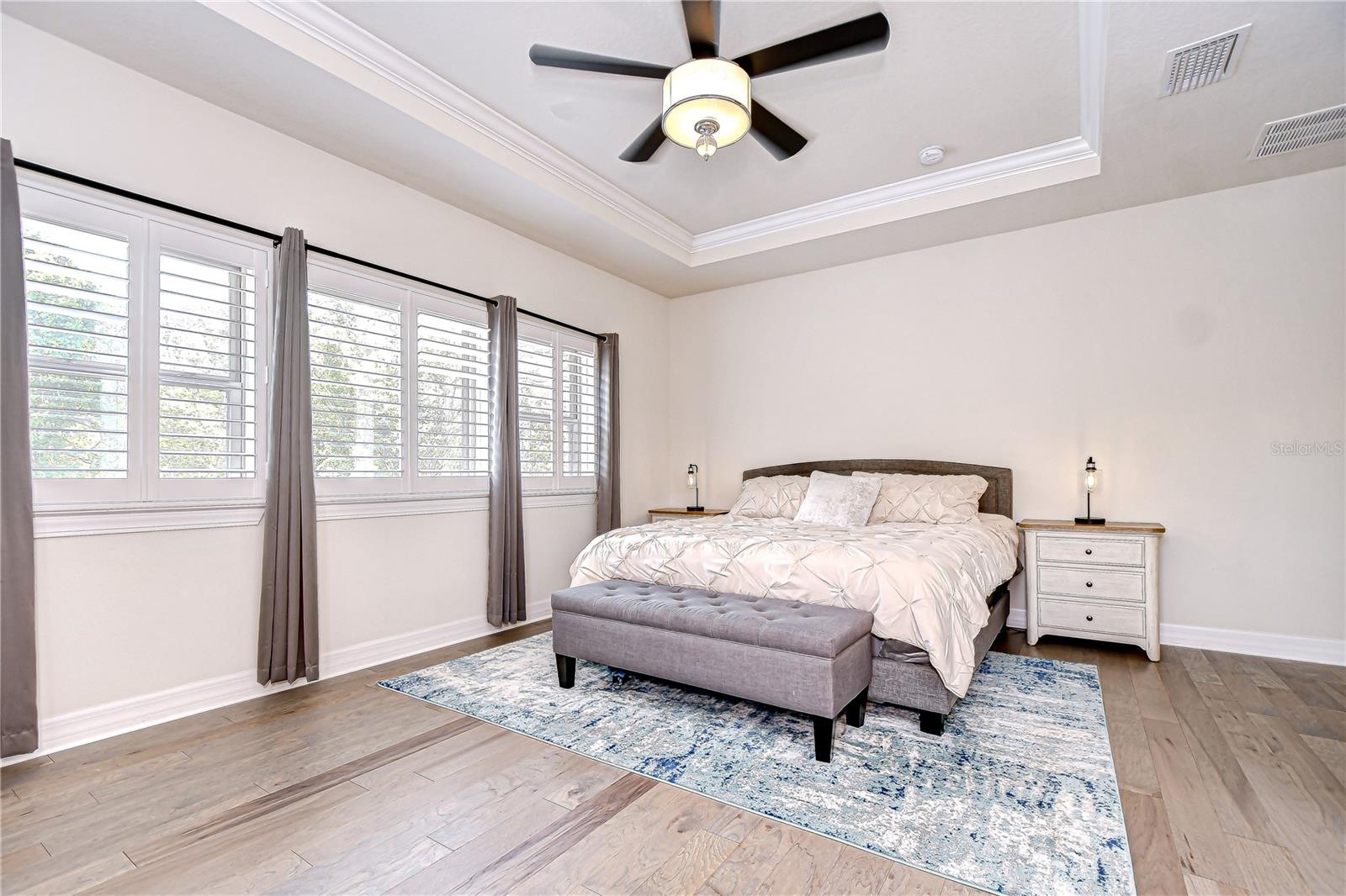 Absolutely amazing primary suite with updated flooring!