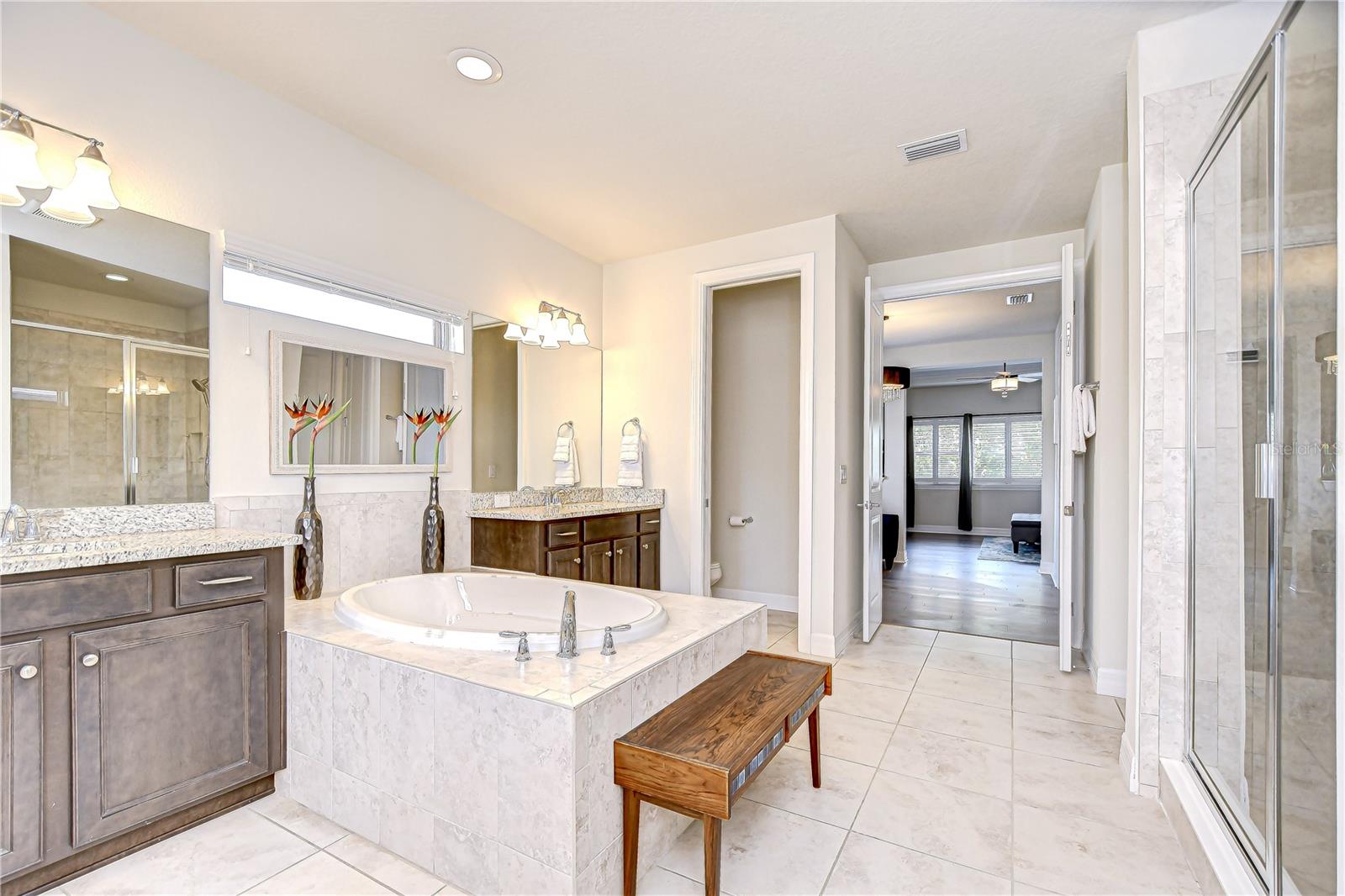 Indulge in spa-like luxury with this primary bathroom!