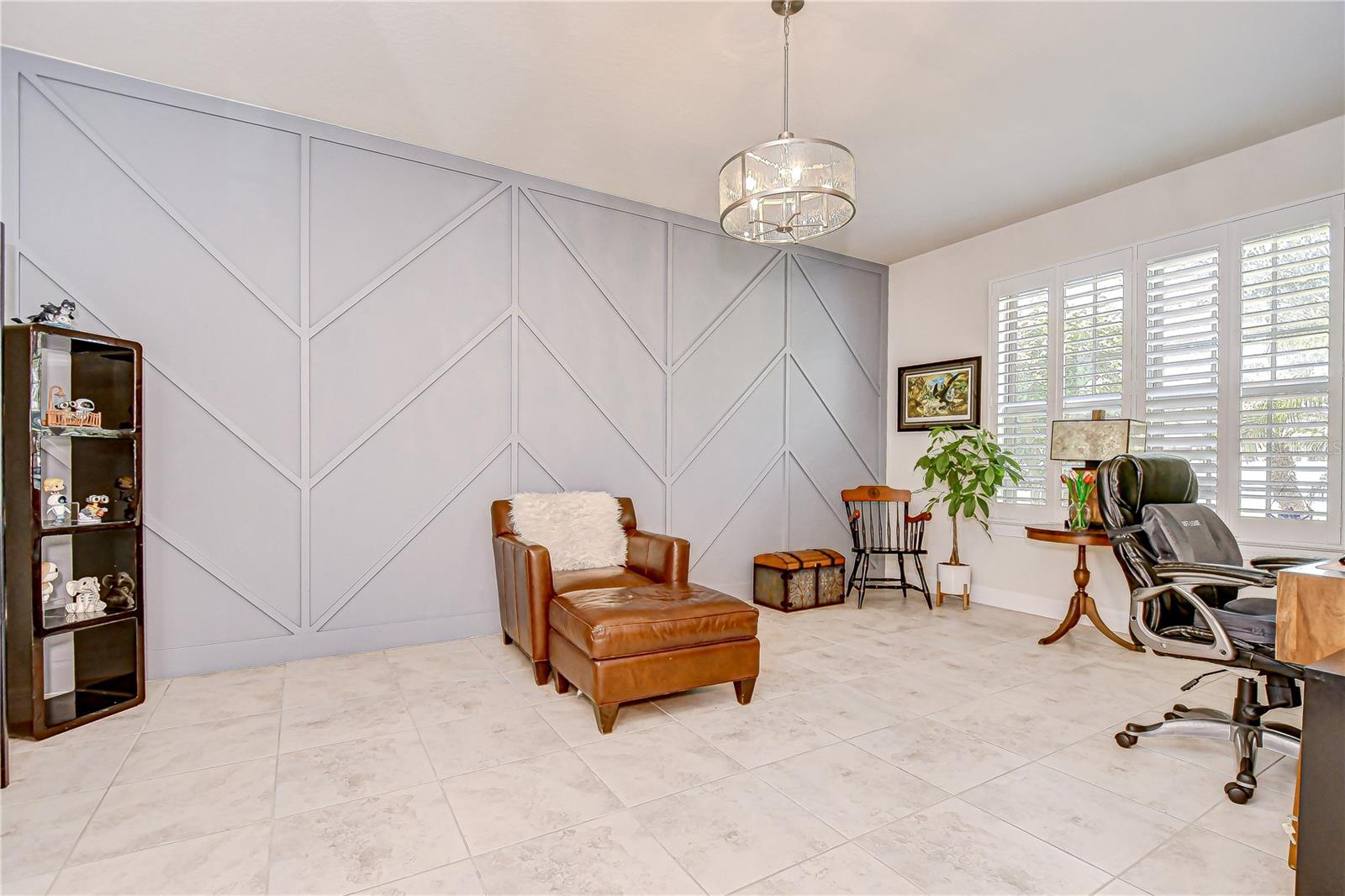 Stylish home office with modern accents and natural light!