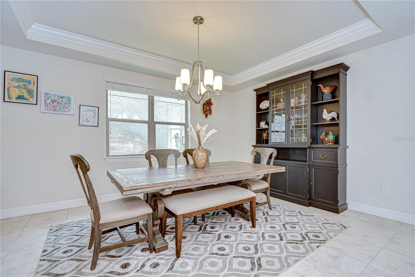 Dining room boasts crown molding & plenty of space for gathering!