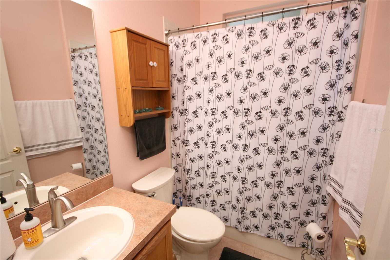 Downstairs bathroom, only a few steps from separate door to pool & spa area!
