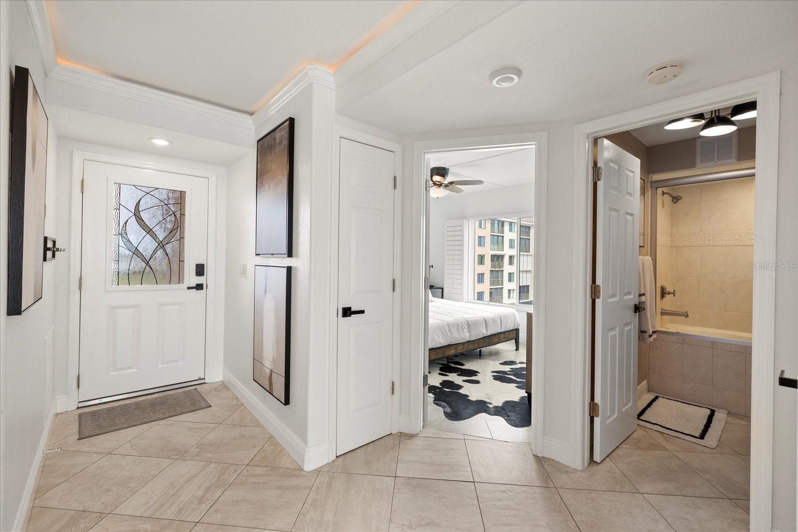 Entry door/guest bedroom and bathroom 1