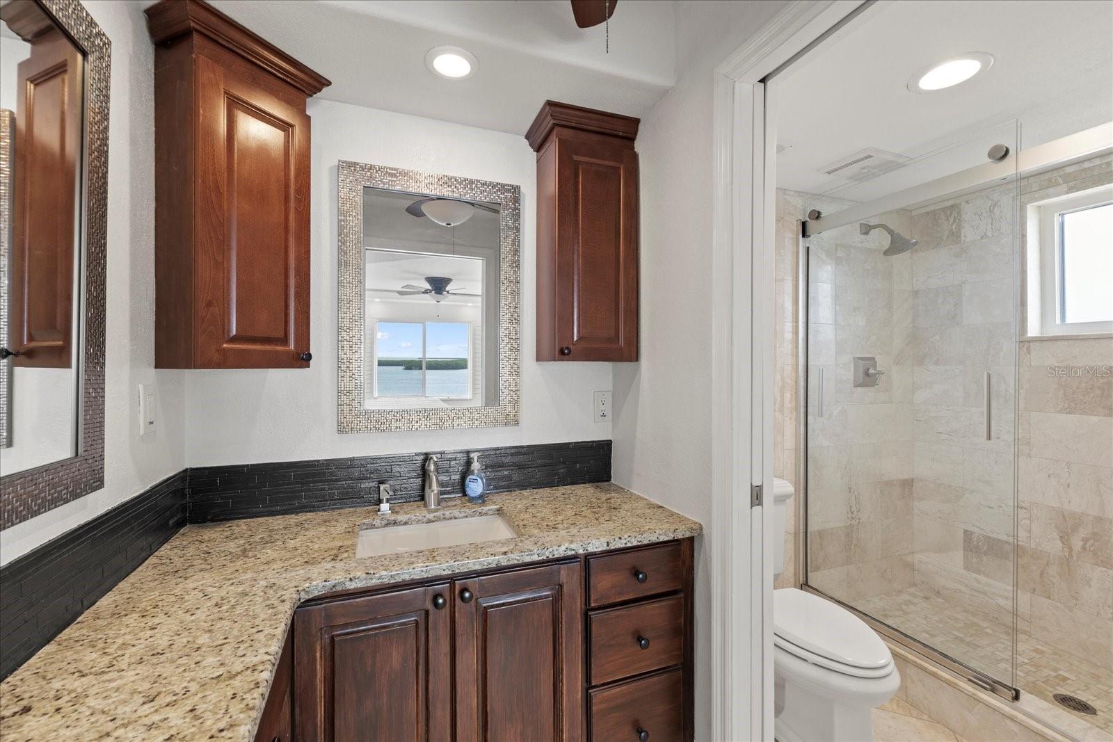 Luxury vanity and walk in shower in Primary suite