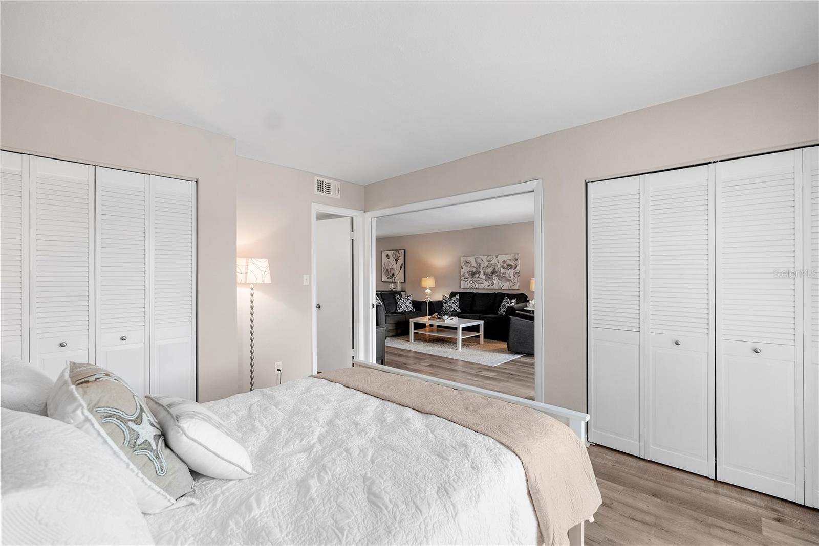 Guest Bedroom enclosed by a large pocket door