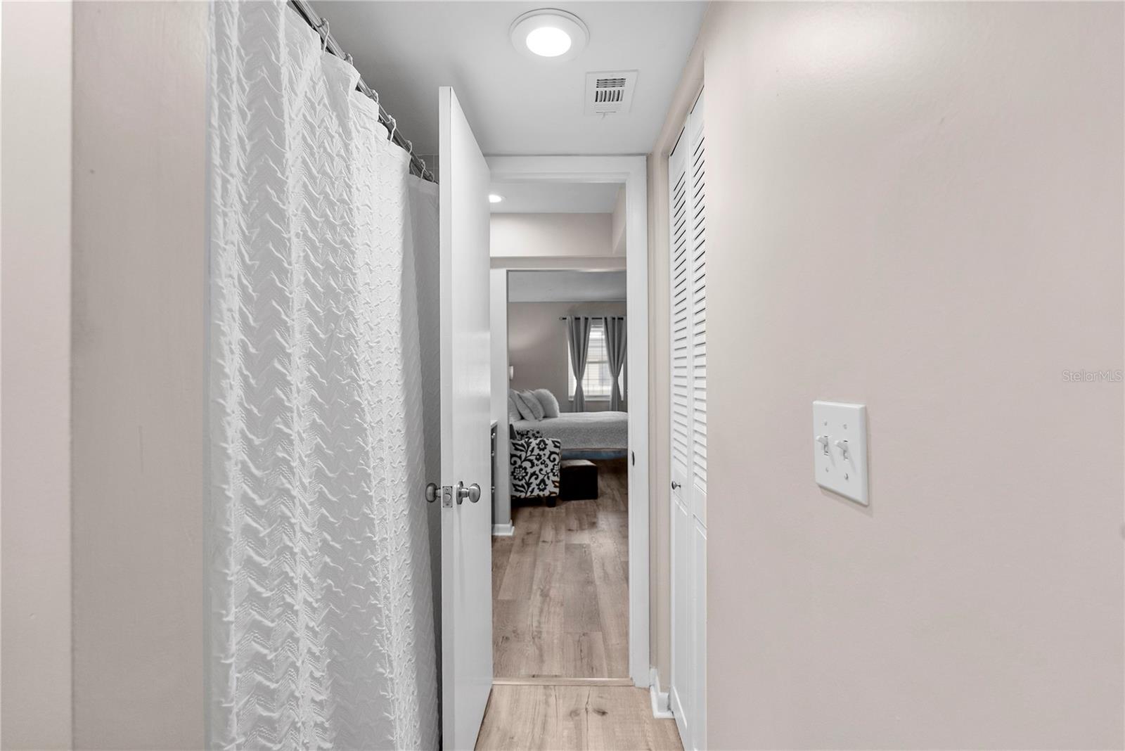 From primary bathroom looking into bedroom