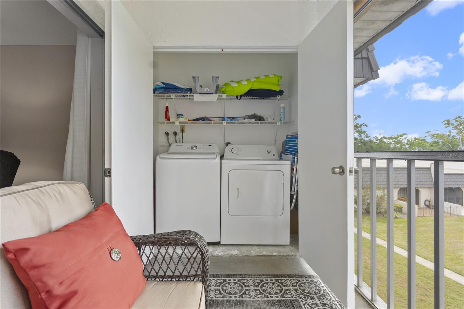 Laundry closet w/ storage shelves