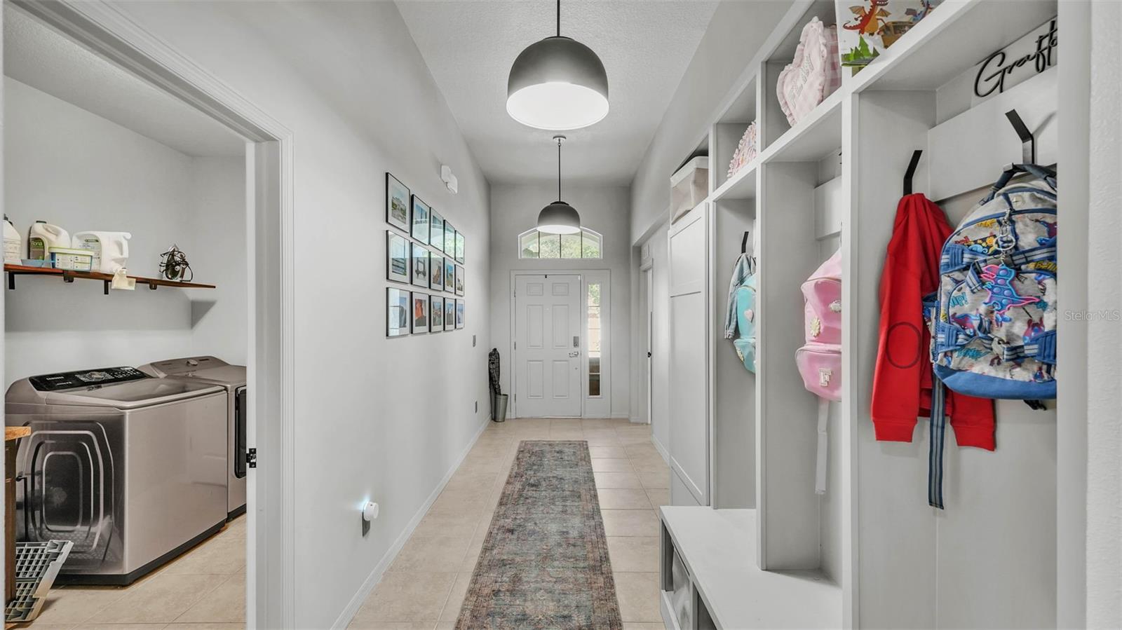 Entrance; laundry to left. Bonus and office room on right