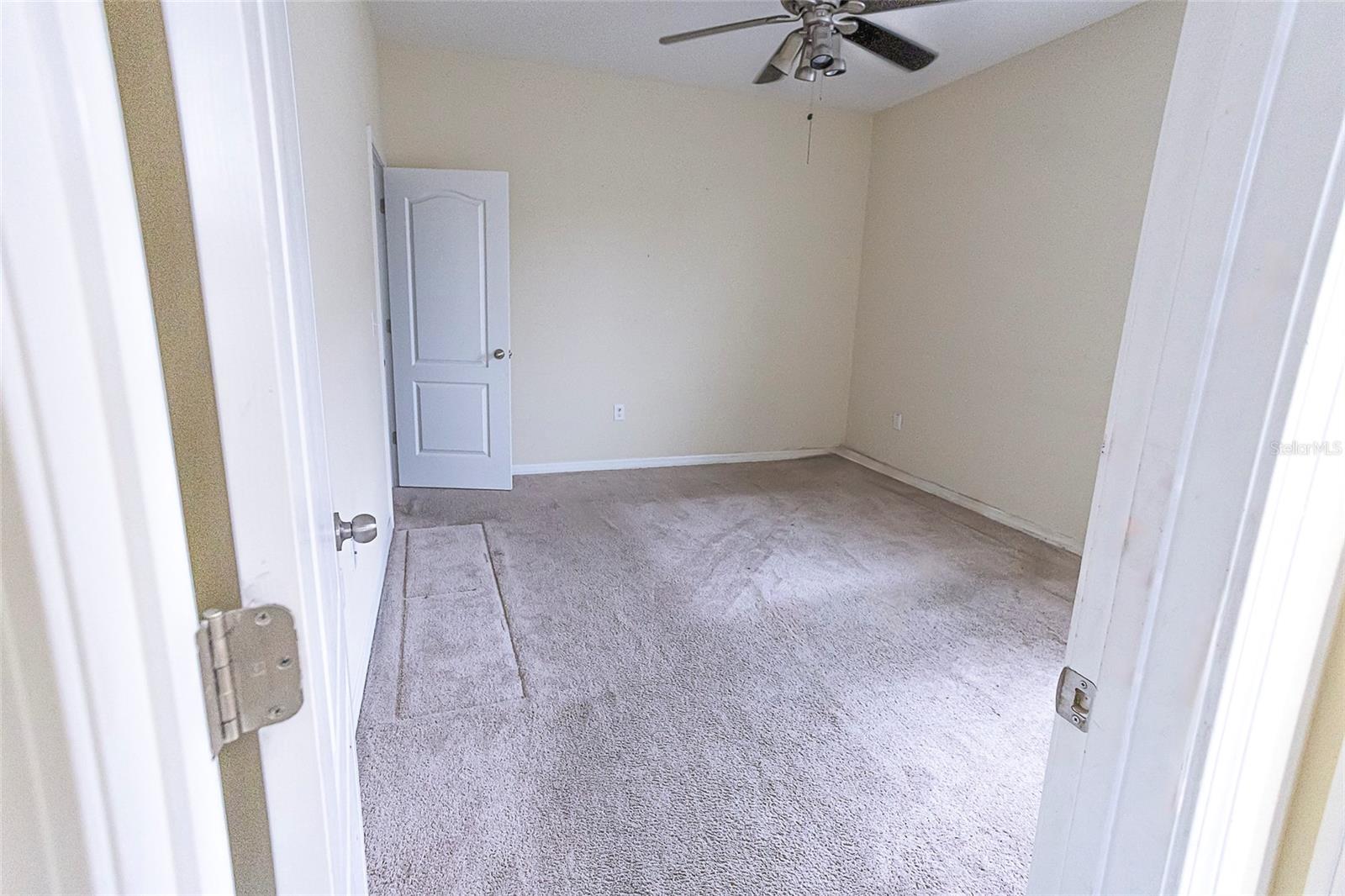First floor bedroom next to first floor bathroom