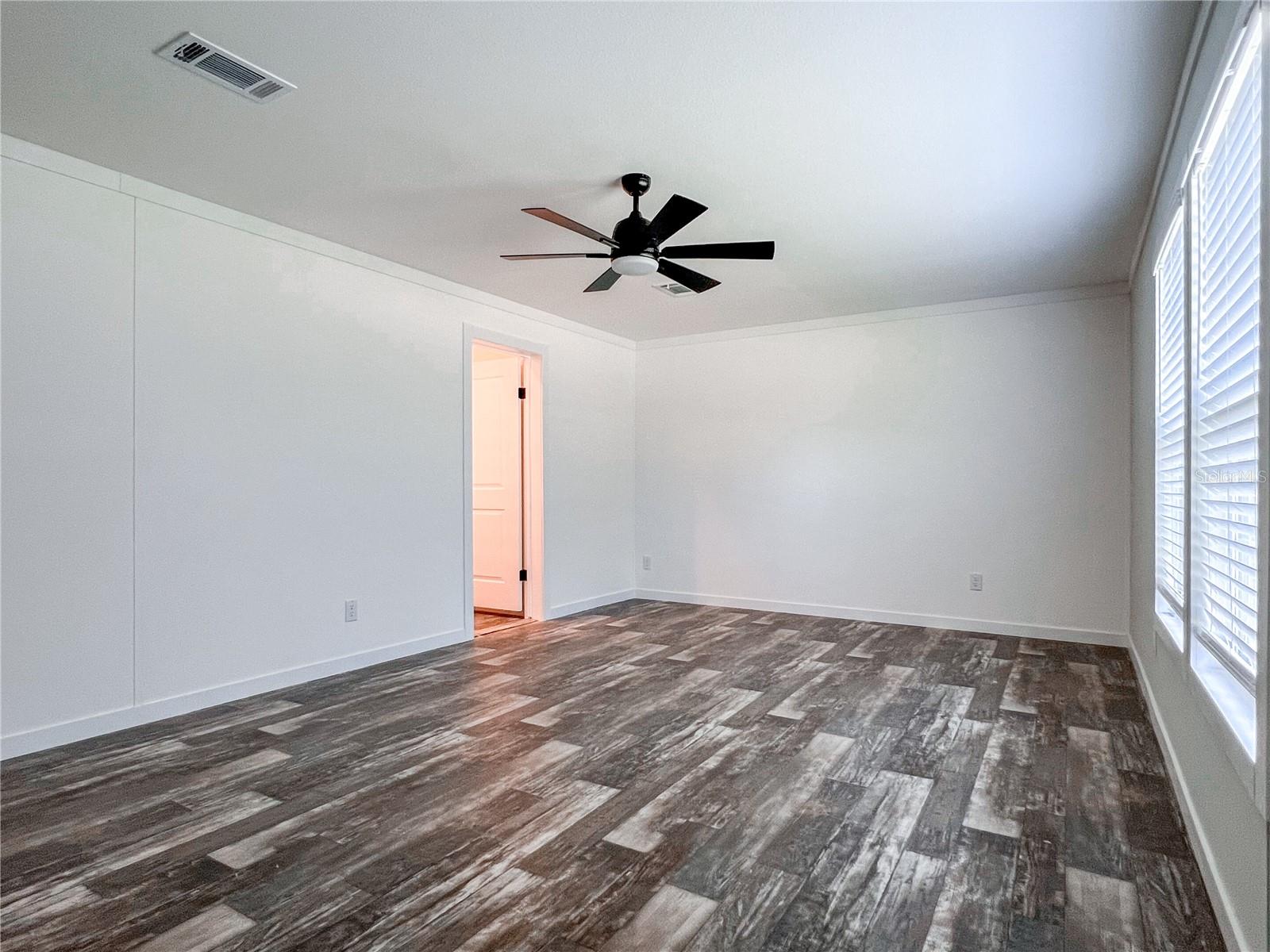 Master bedroom with en-suite bath to the left.