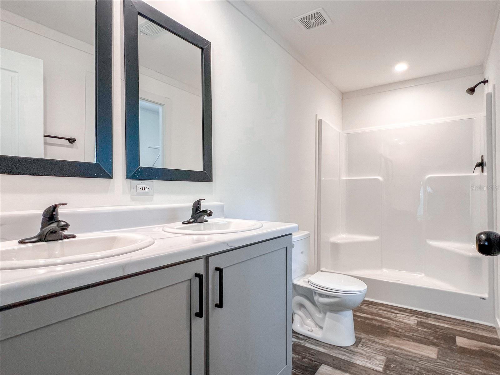 Master bedroom bathroom with WIC to the right.