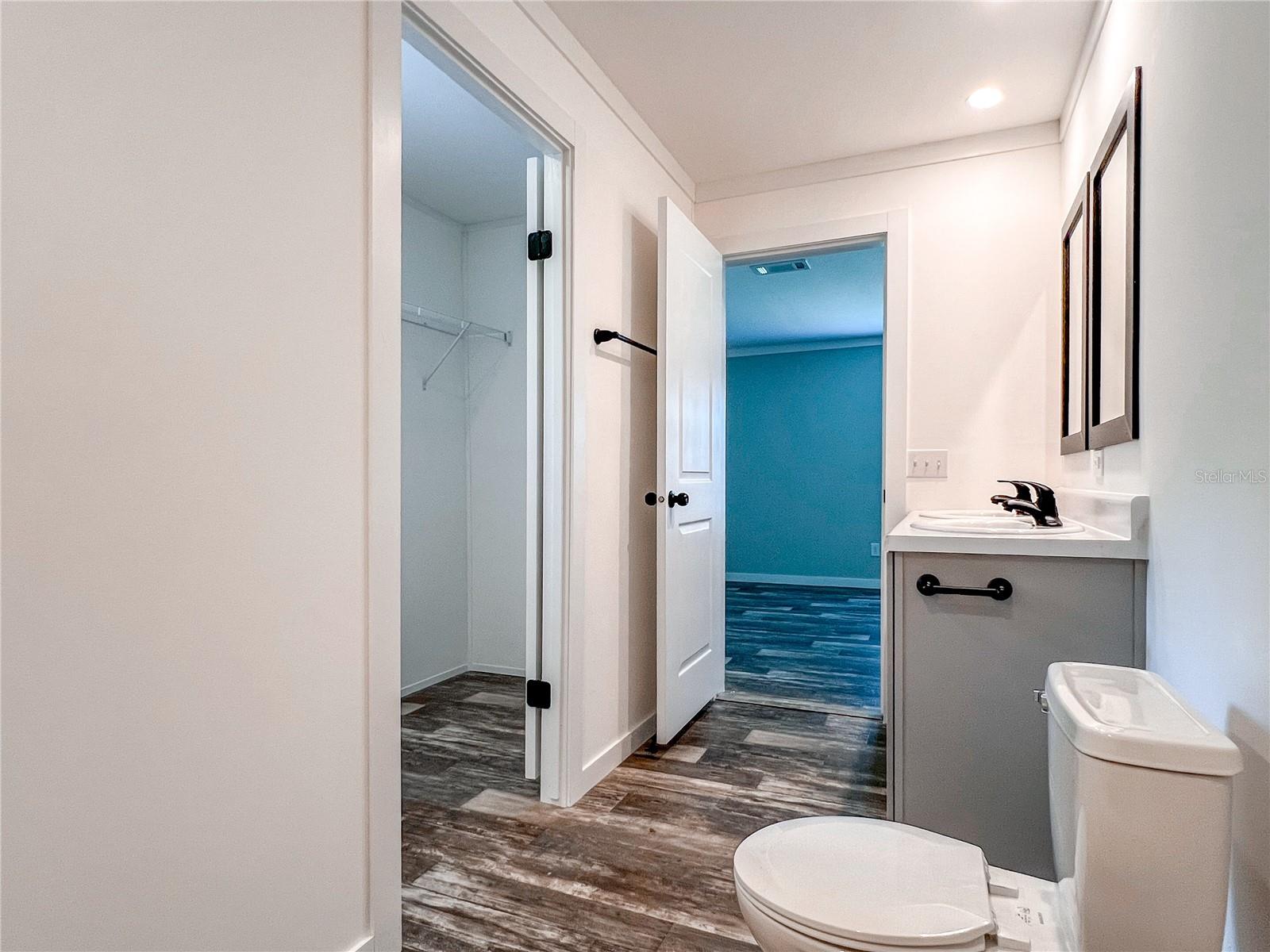 Master bedroom bathroom with WIC to the left.