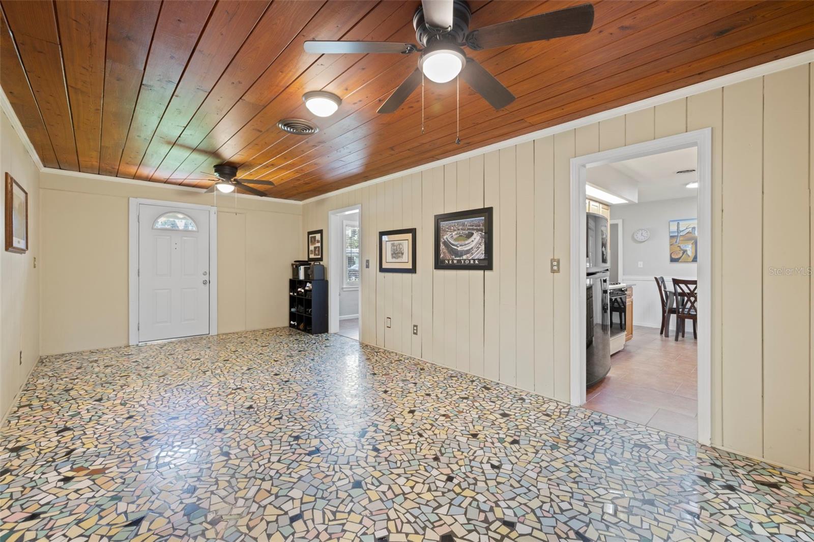 Large Bonus Room with classic vintage Florida Breezeway Terrazzo Flooring and wood paneling!!