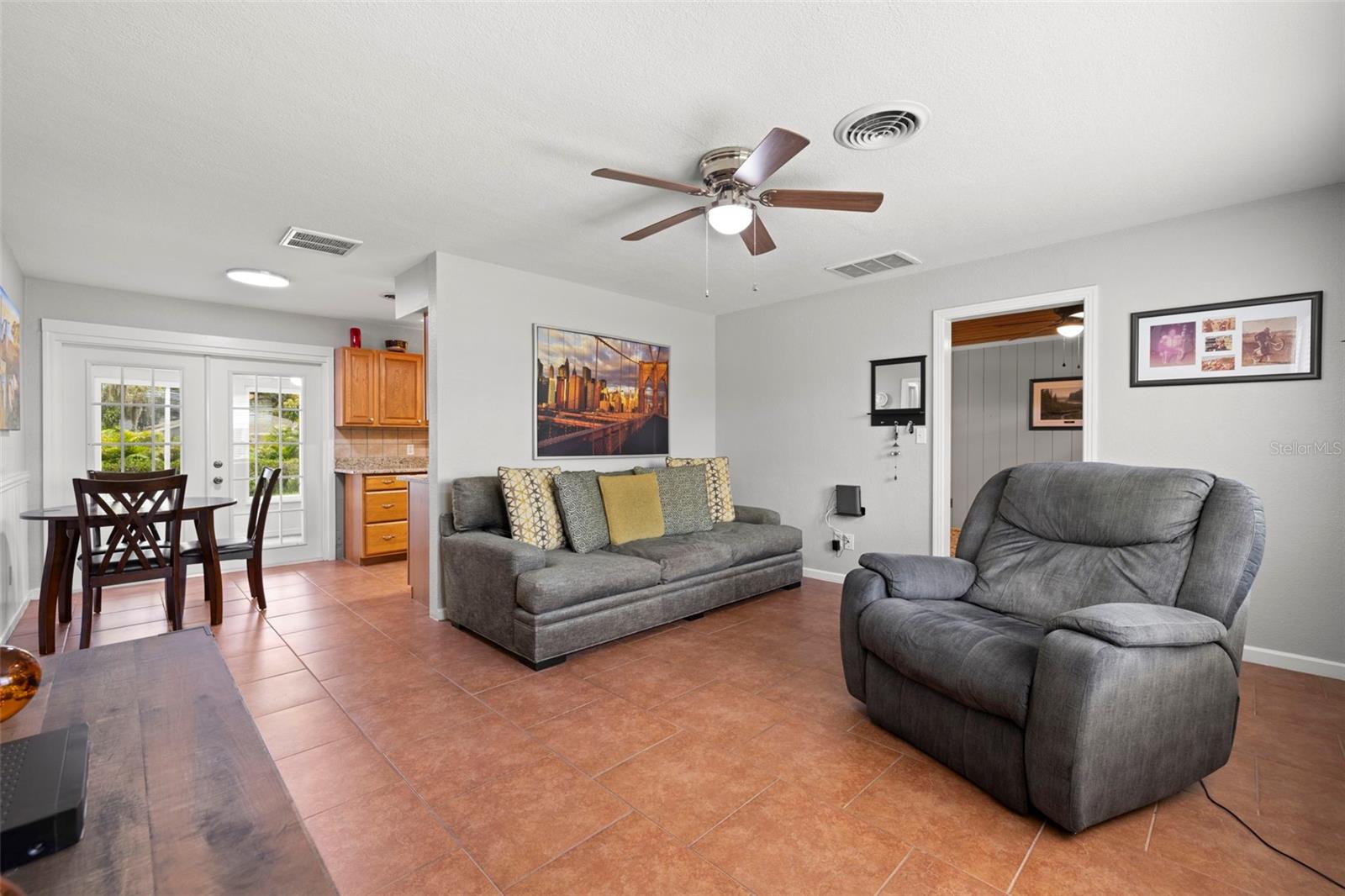 Living Room to eat in Kitchen and Bonus Room/Florida Room