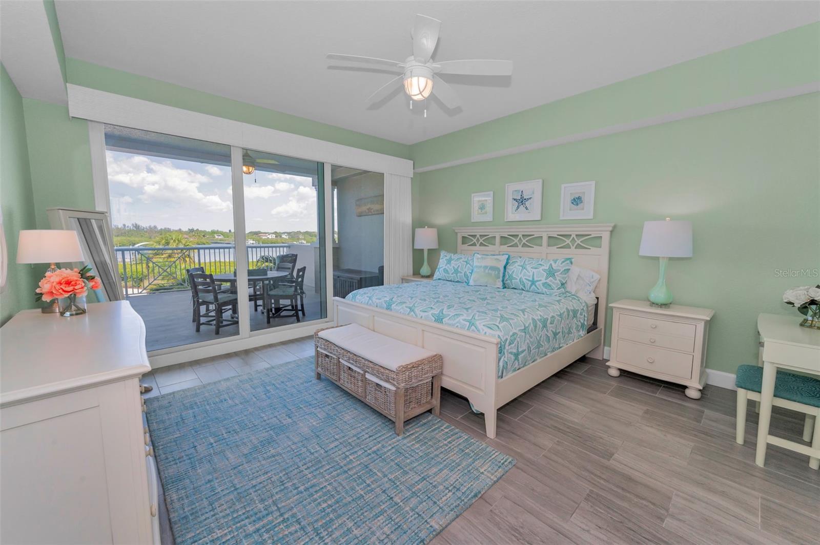 Primary Bedroom with Sliders out to the Waterfront Balcony!