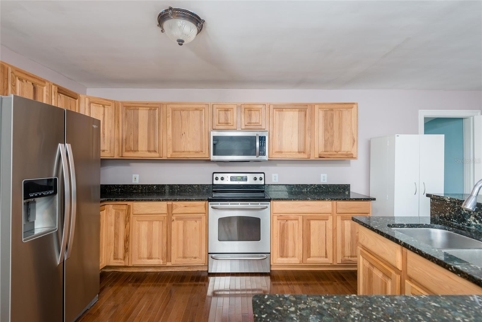 Updated kitchen with bar area