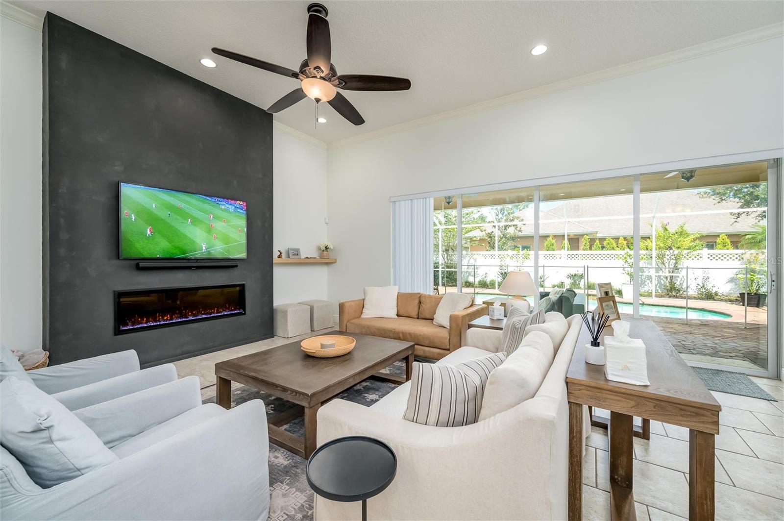 Family Room with sliding glass doors that pocket.