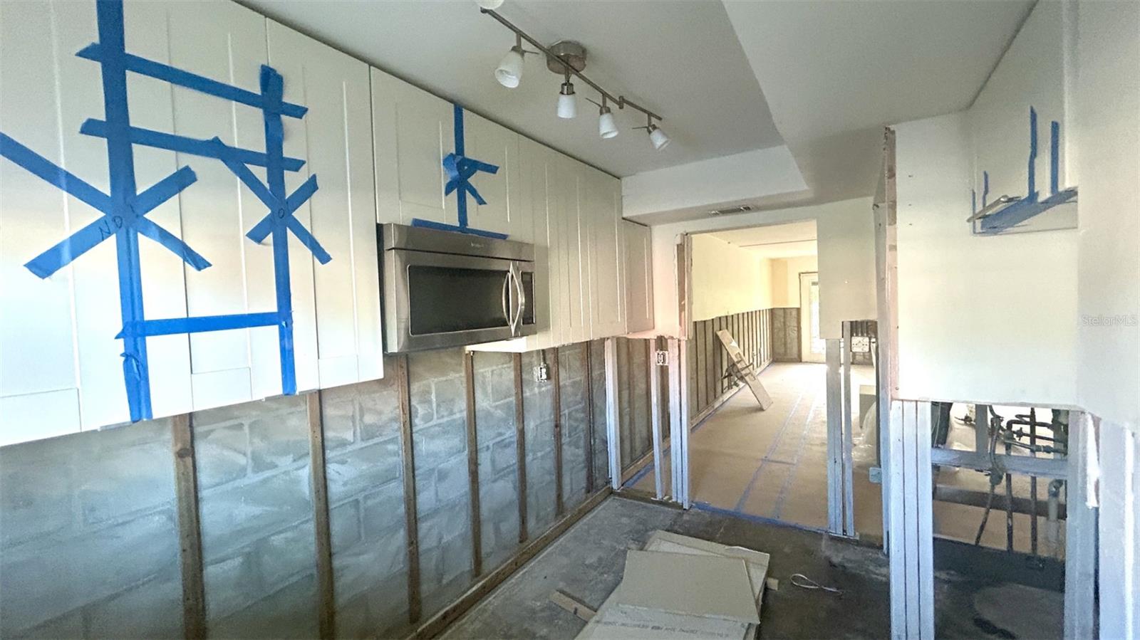 Kitchen with built-in microwave