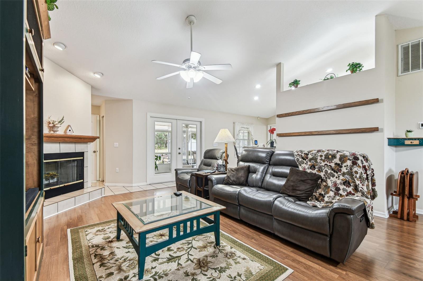 Family room with wood burning fireplace