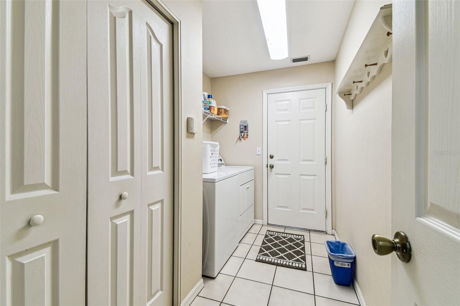 Pantry and laundry with access to attached garage