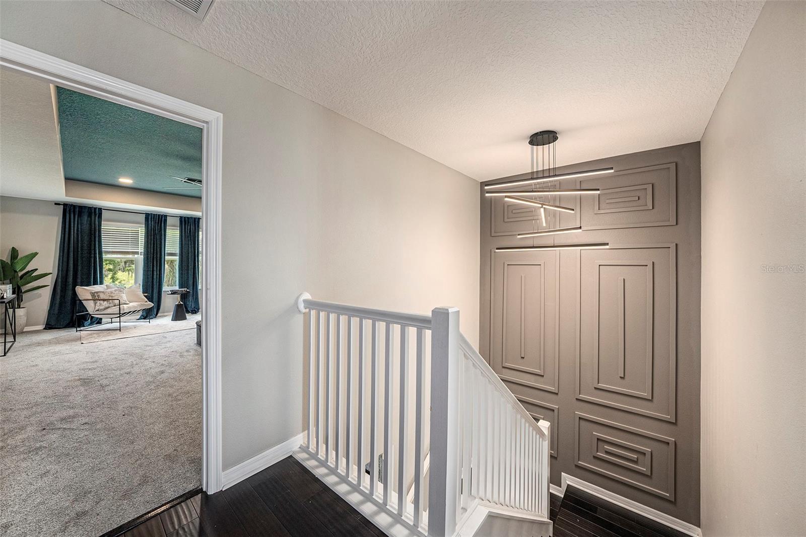 Custom lighting throughout the home, and professionally designed accent walls