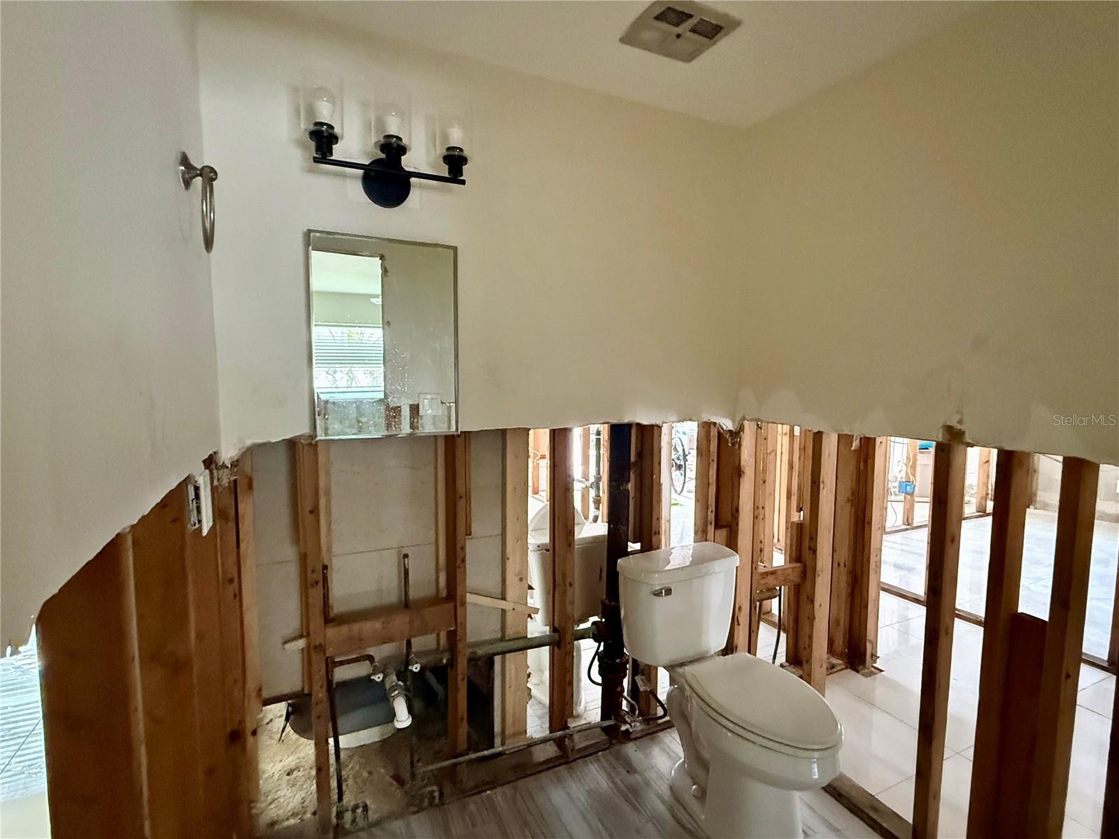 19. Private Half Bath in Bedroom 3