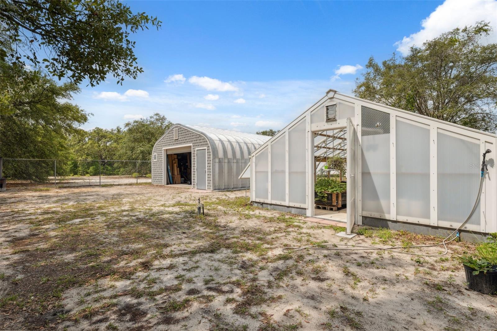 Greenhouse and Detached Garage