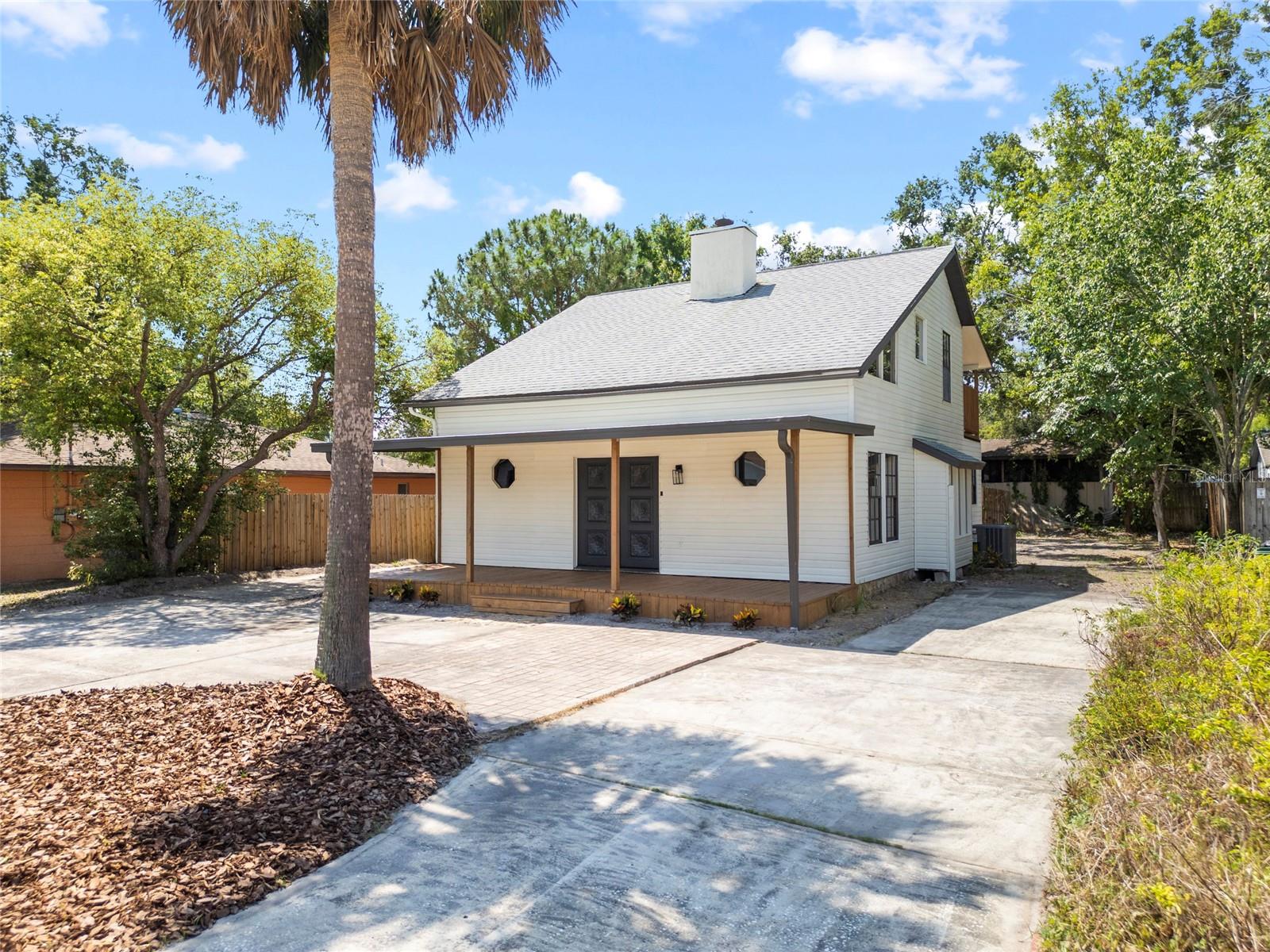 Front View with Wrap Around Driveway