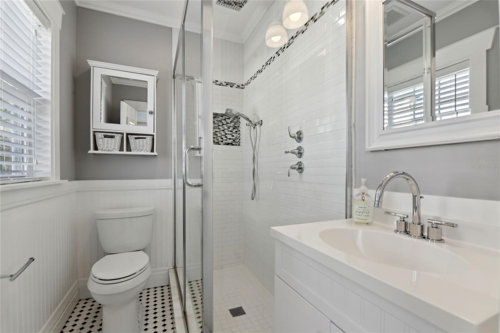 Two of the upstairs en-suite bathrooms are equipped with stand up showers.