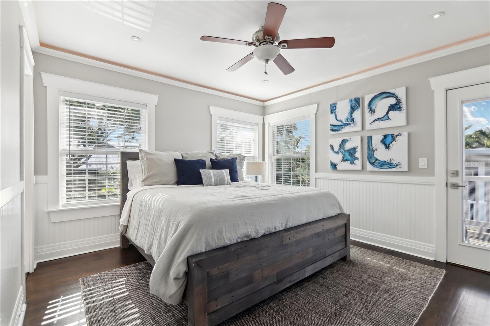 This upstairs bedrooms feature private access to the balcony.