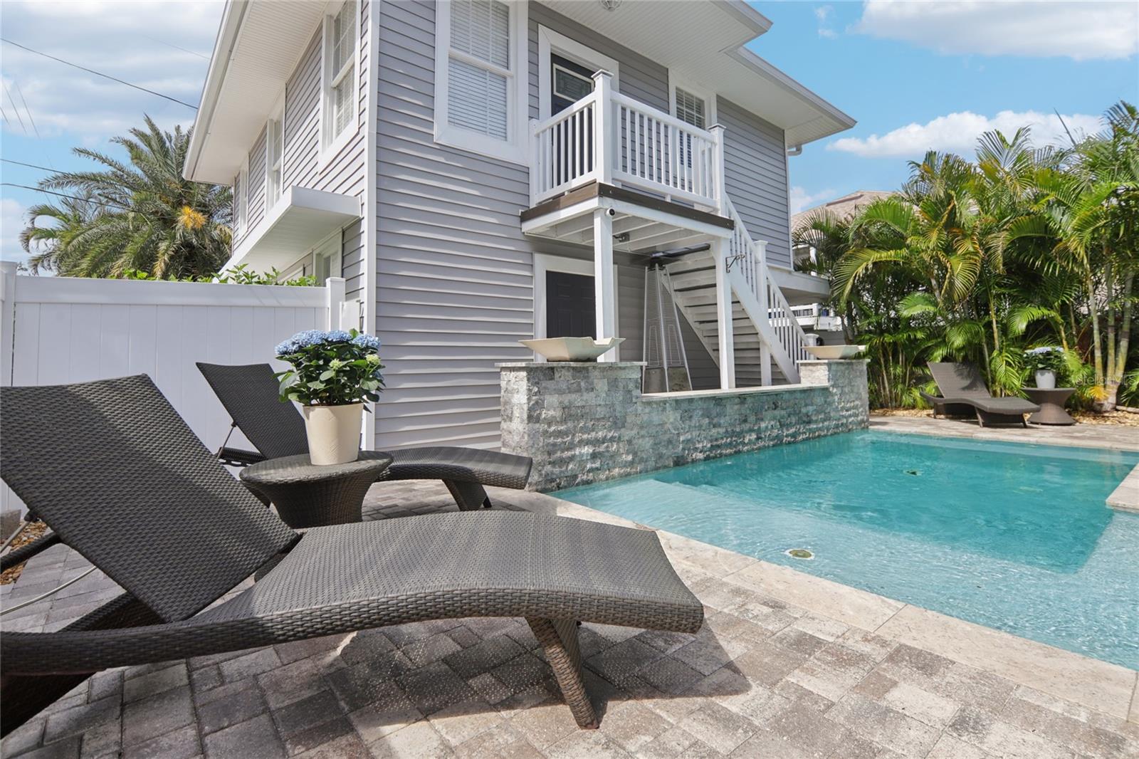 Upstairs ADU access is shown here. Enjoy the heated saltwater pool.