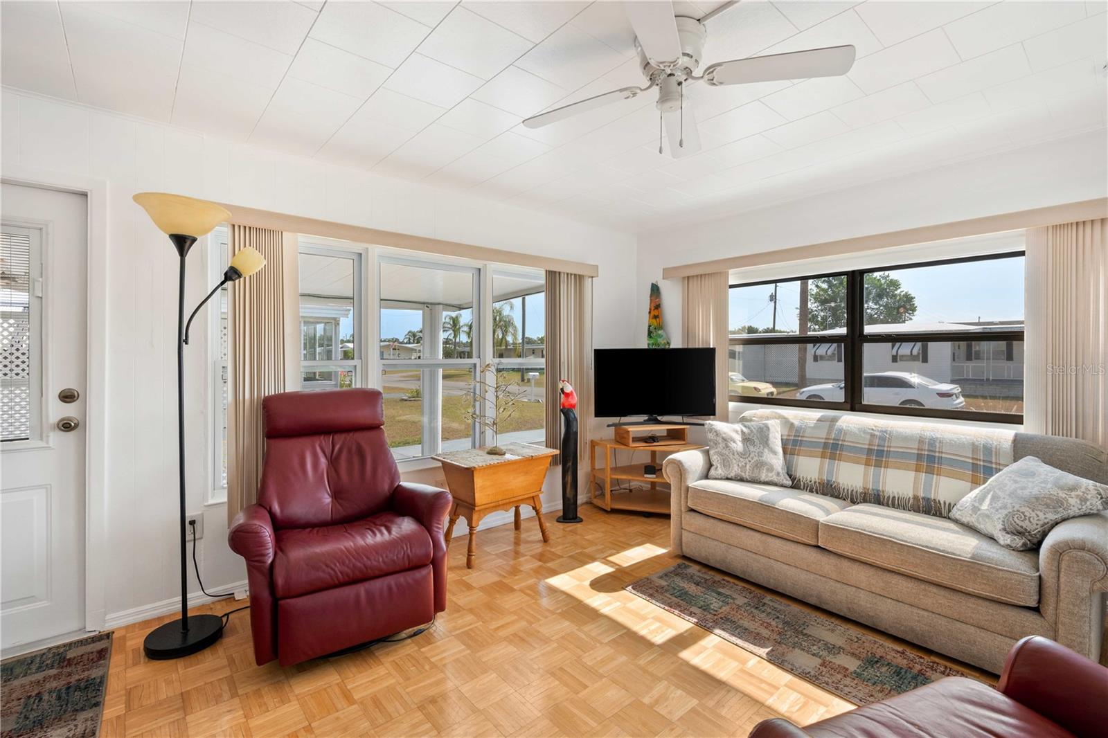 Ceiling fans, wood floors, double pane windows, and so much more.