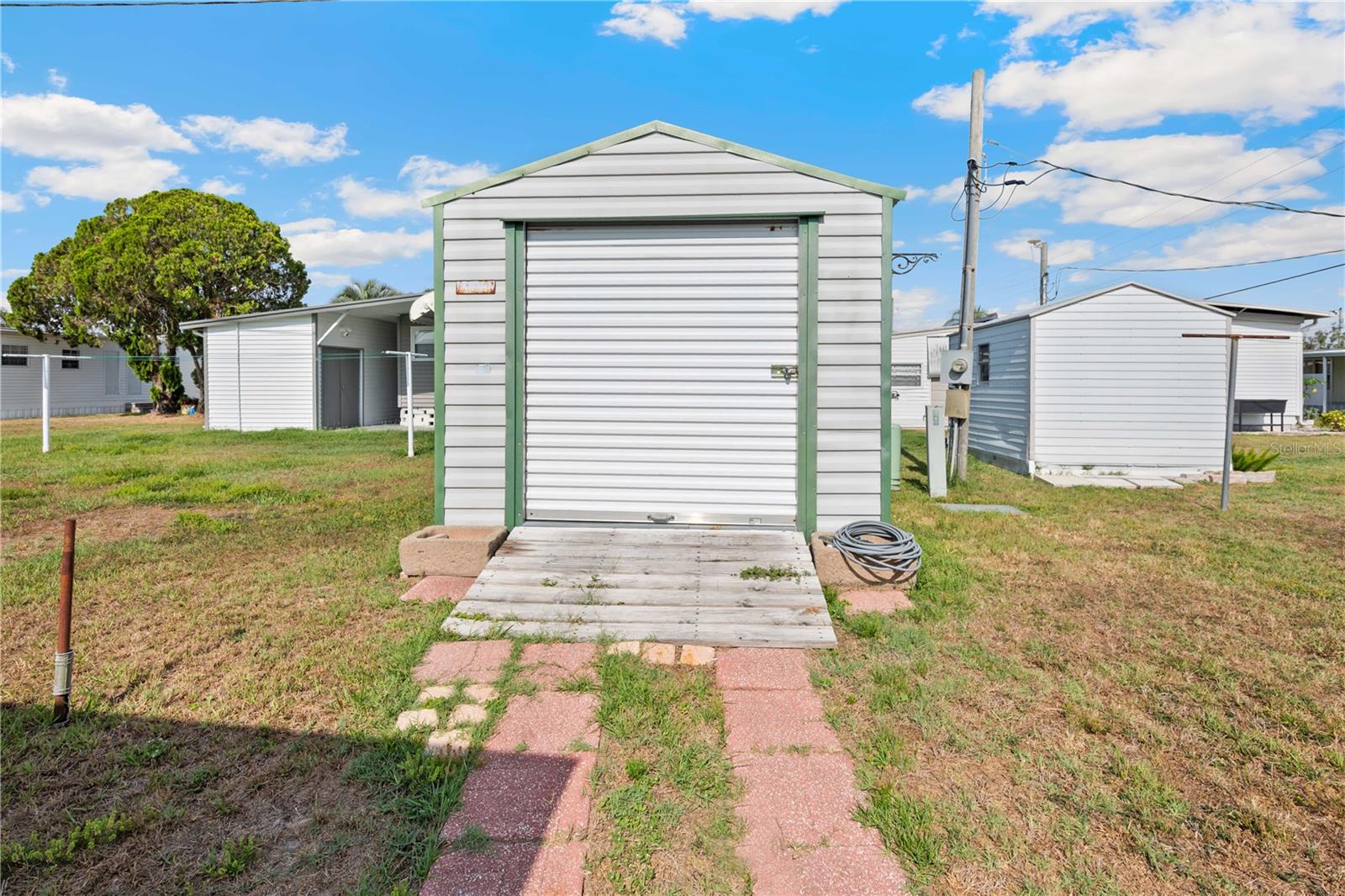 Golf cart detatched shed.