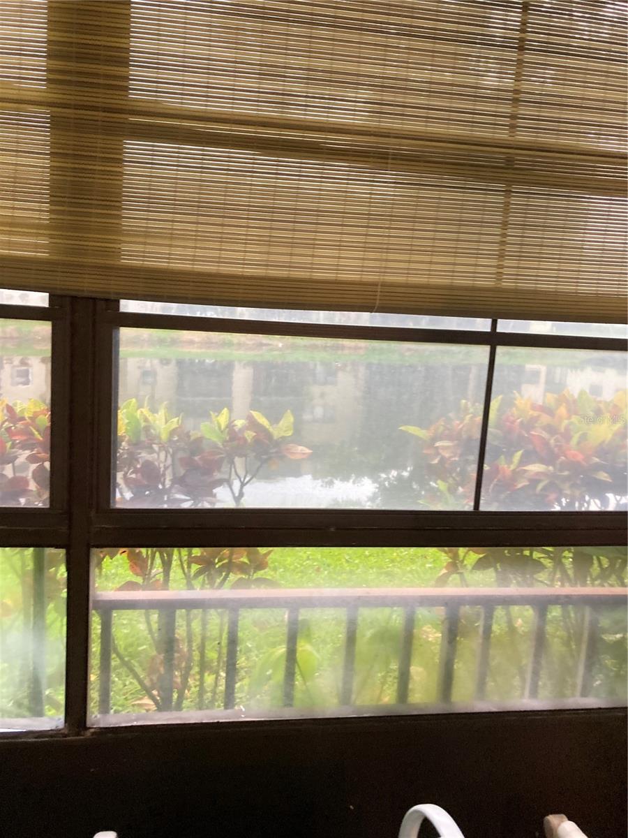 Waterfront screened porch with vinyl windows