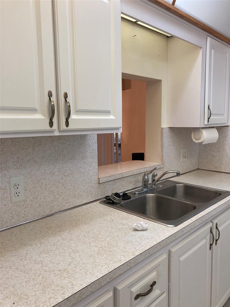 Kitchen pass thru to dining room