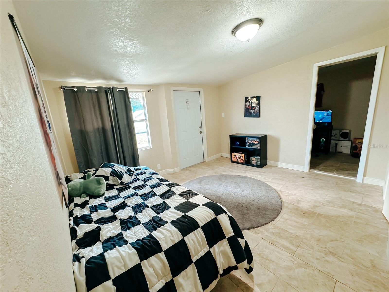 Bedroom 4 walk-in closet currently a teens gamer room