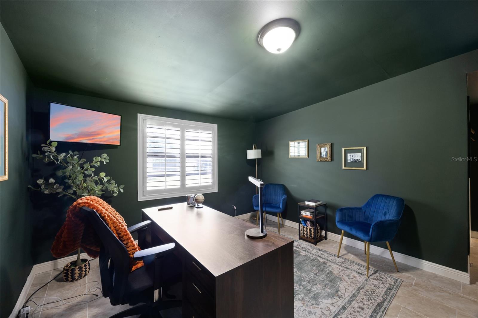 Bonus room is currently a school room overlooking the backyard
