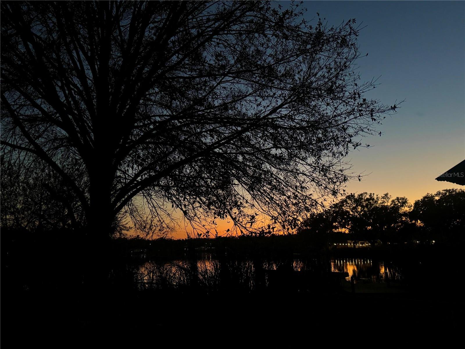 Enjoy amazing Florida sunsets overlooking the lake from your backyard.