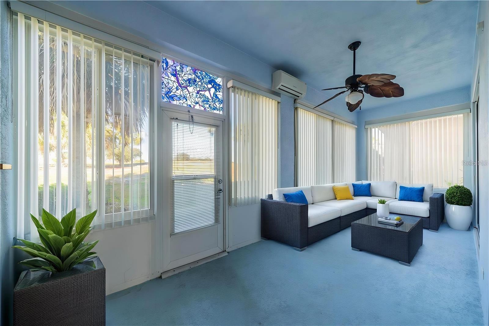 Master bedroom out to lanai and golf course