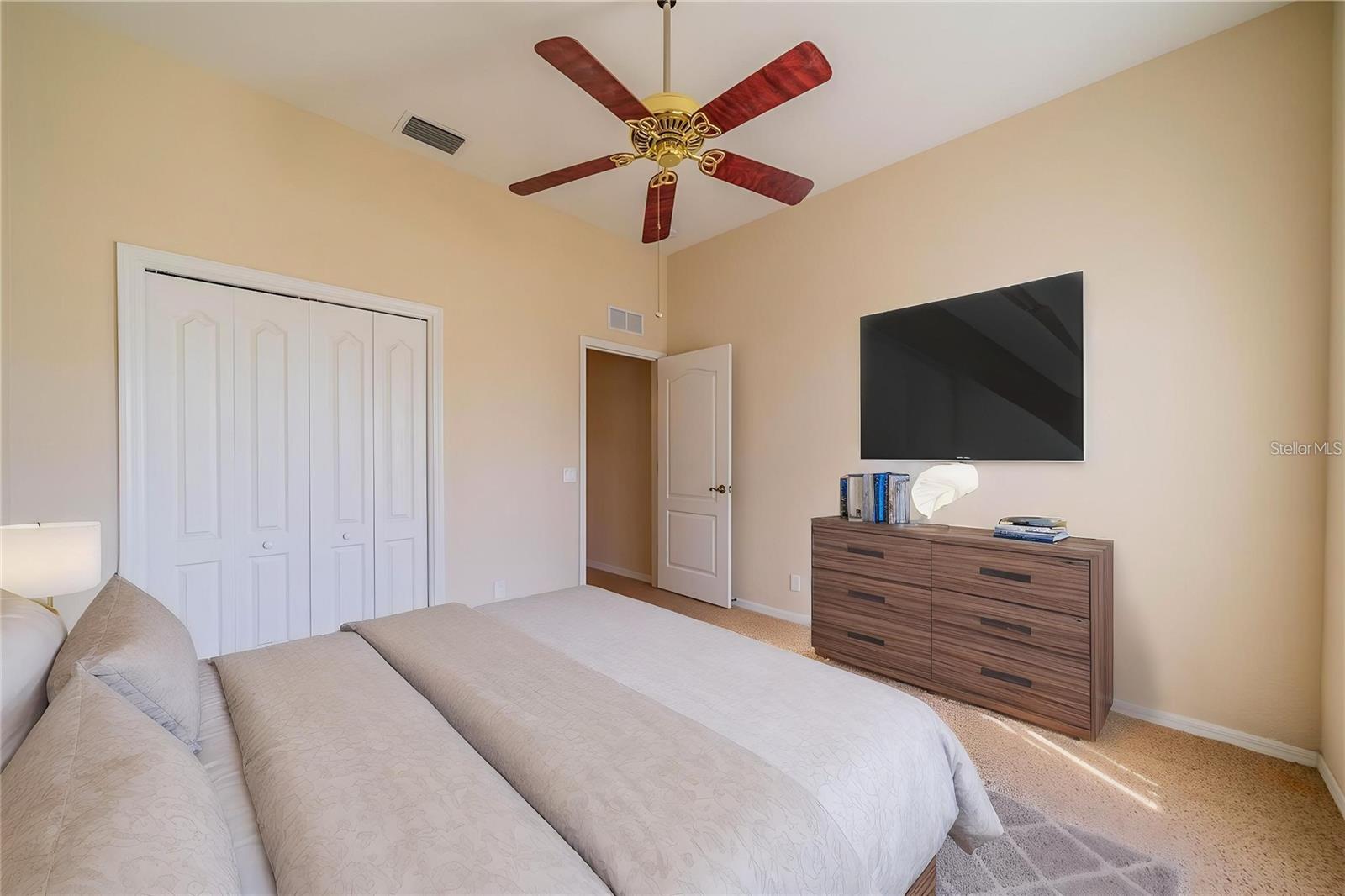 Storage closet under stairway goes all around behind steps