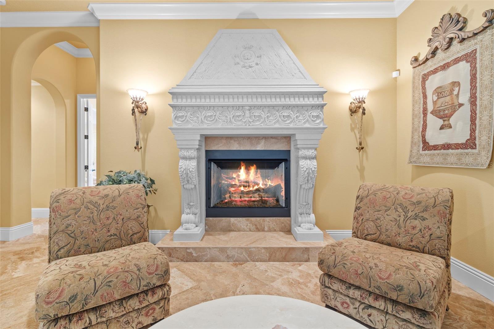 Custom marble fireplace.