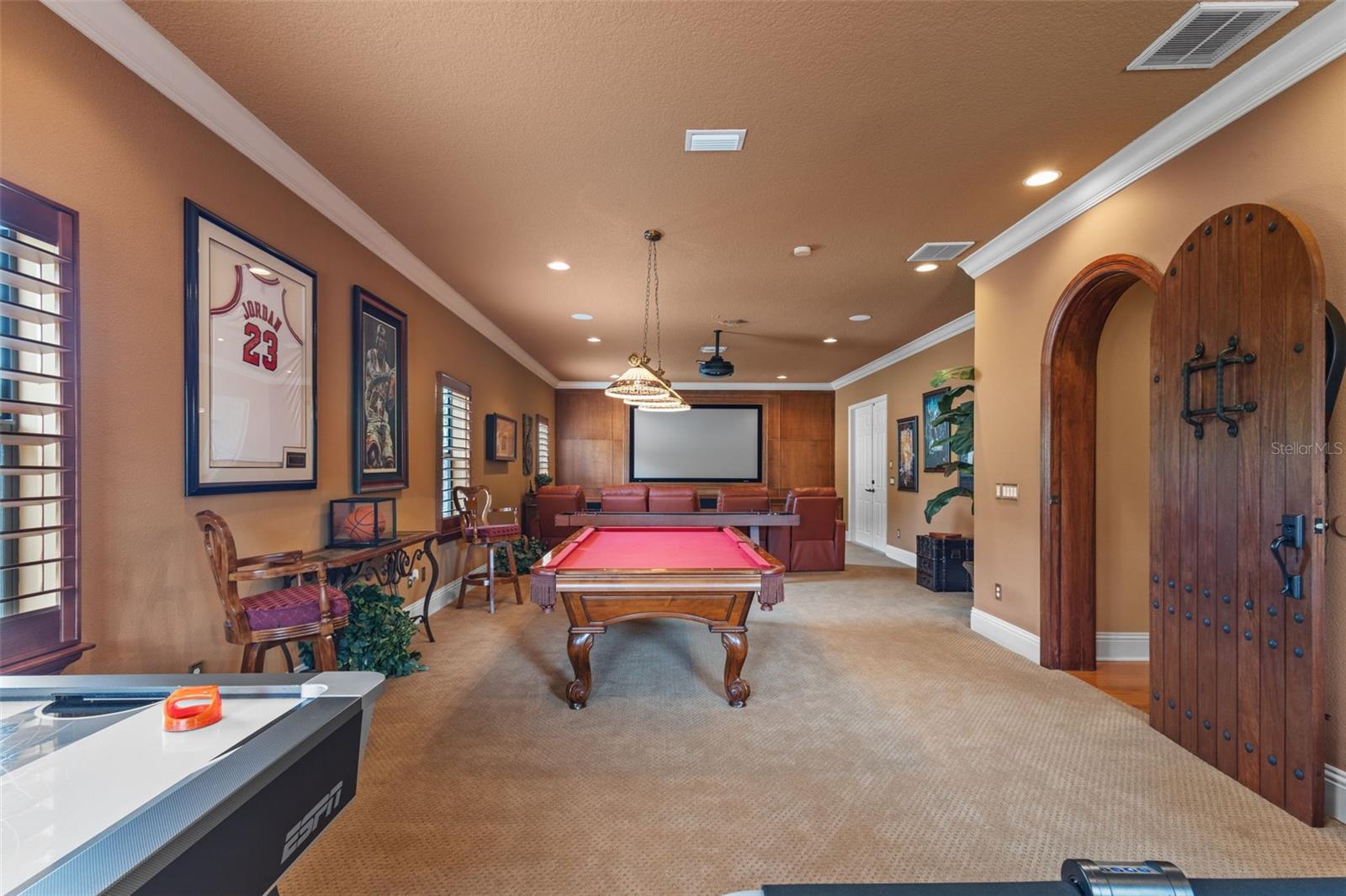 Furnished game room/home theater.
