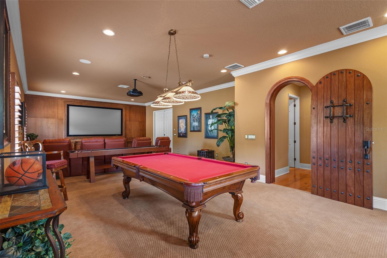 Furnished game room/home theater.
