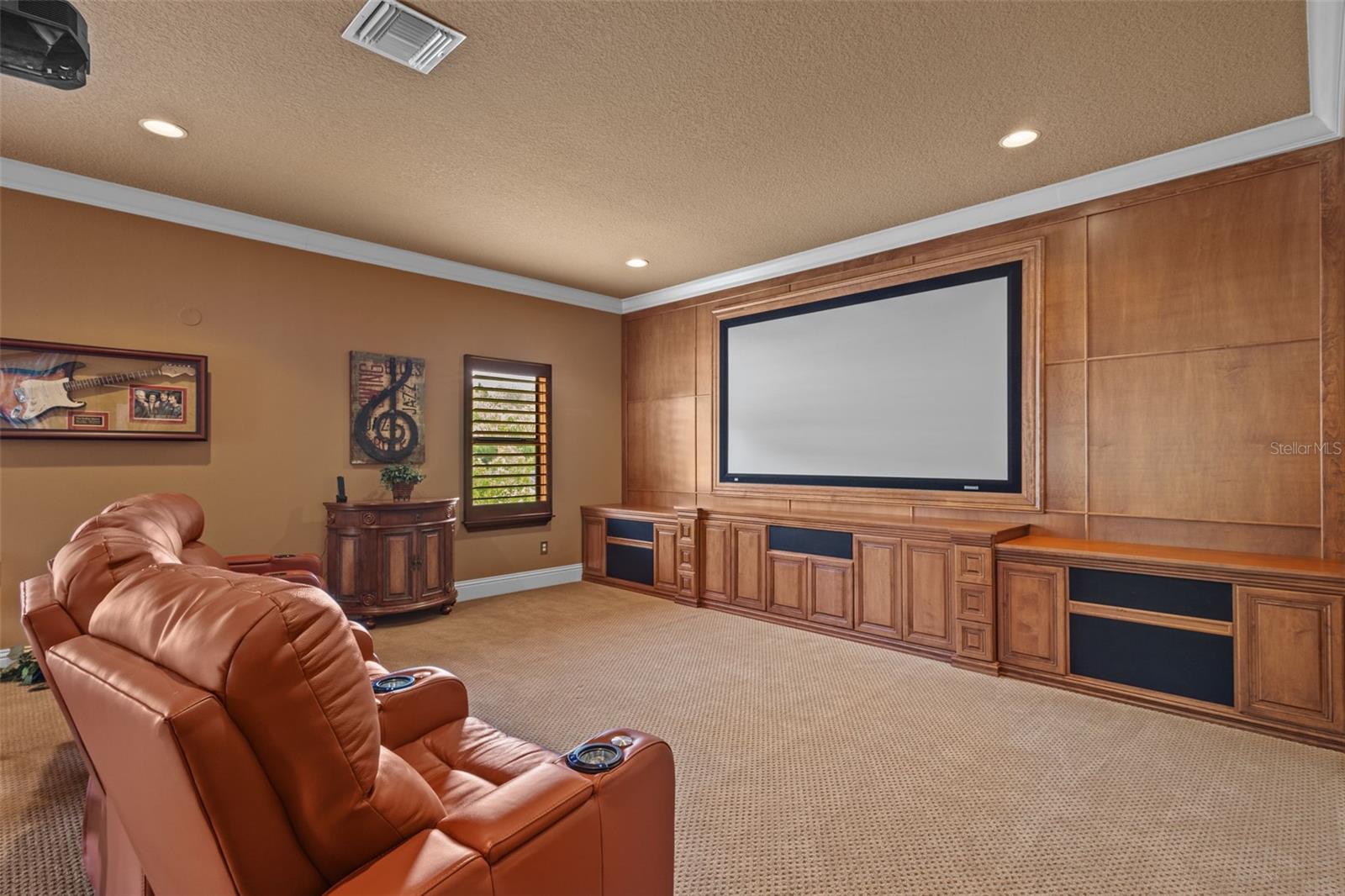 Furnished game room/home theater.