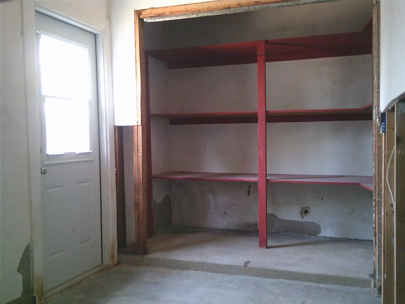 Bonus room in garage with large storage closet