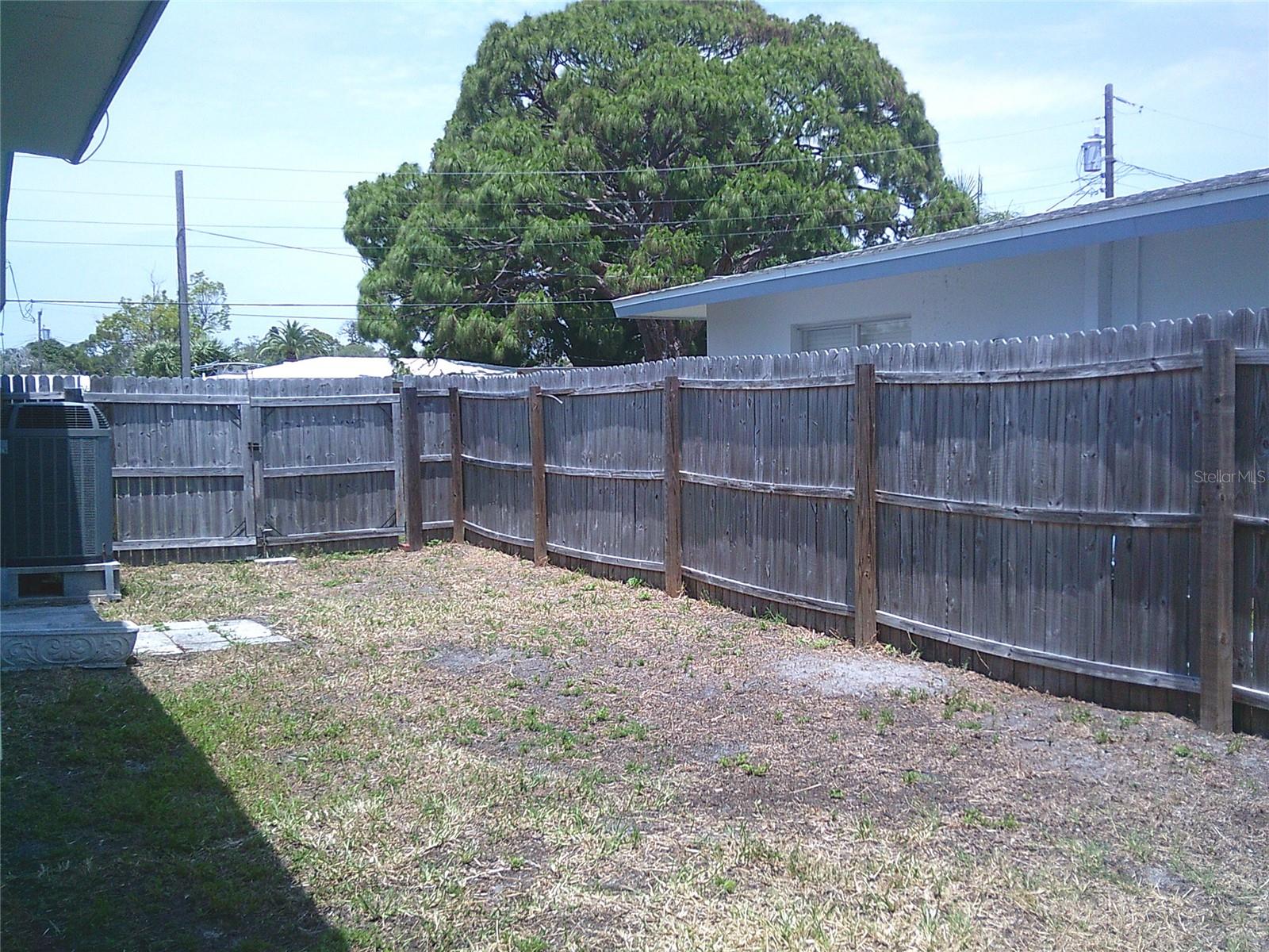 Fully fenced yard with 2 access gates