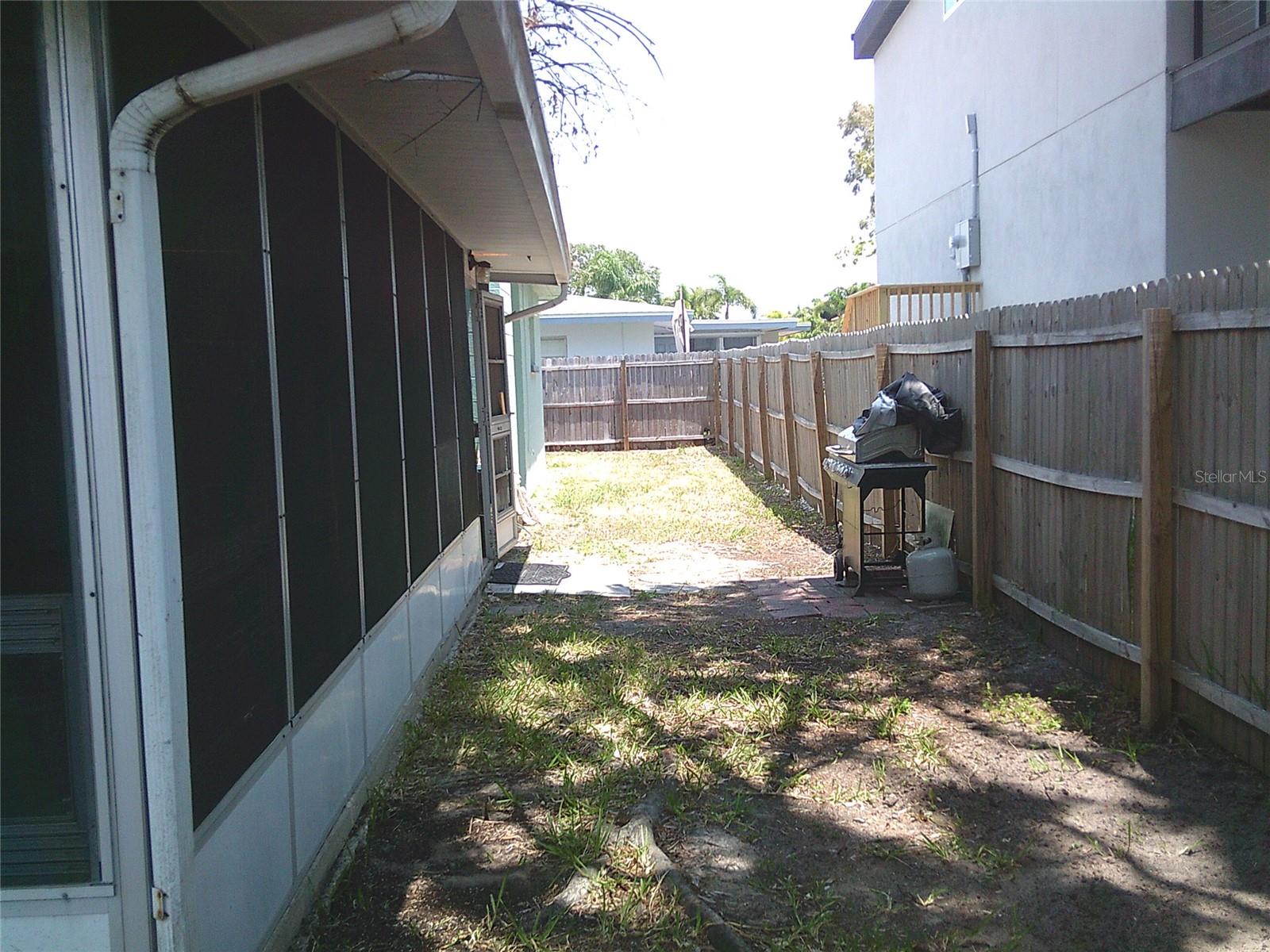 Fully fenced yard with 2 access gates