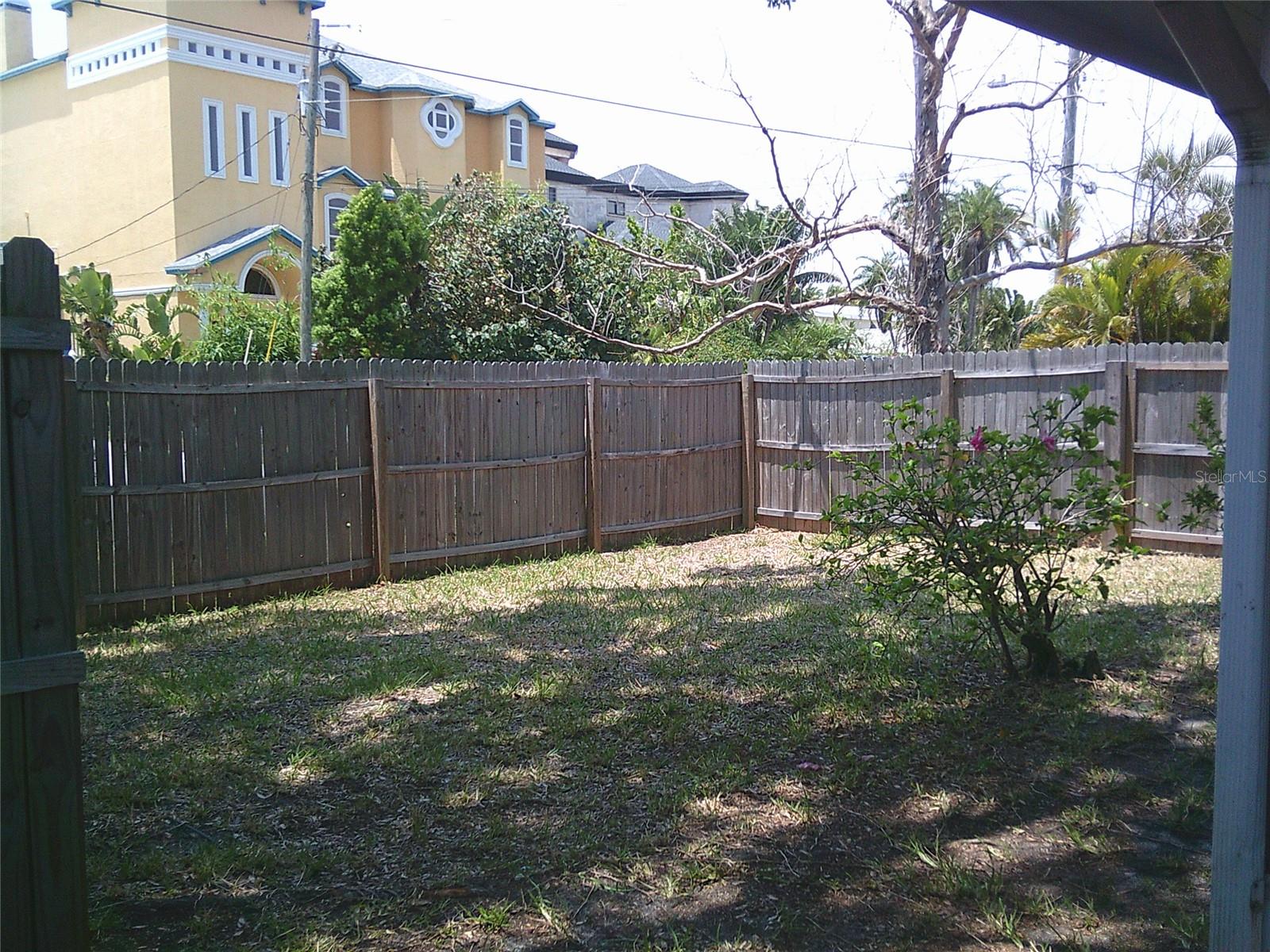 Fully fenced yard with 2 access gates